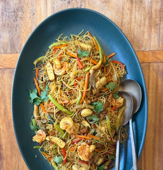 The Surprising Story of Singapore Noodles: From Hong Kong to Global Tables